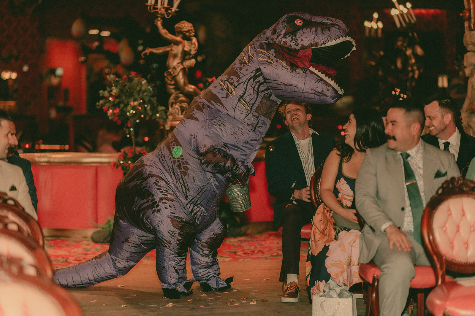 Whimsical Madonna Inn décor framing wedding guests