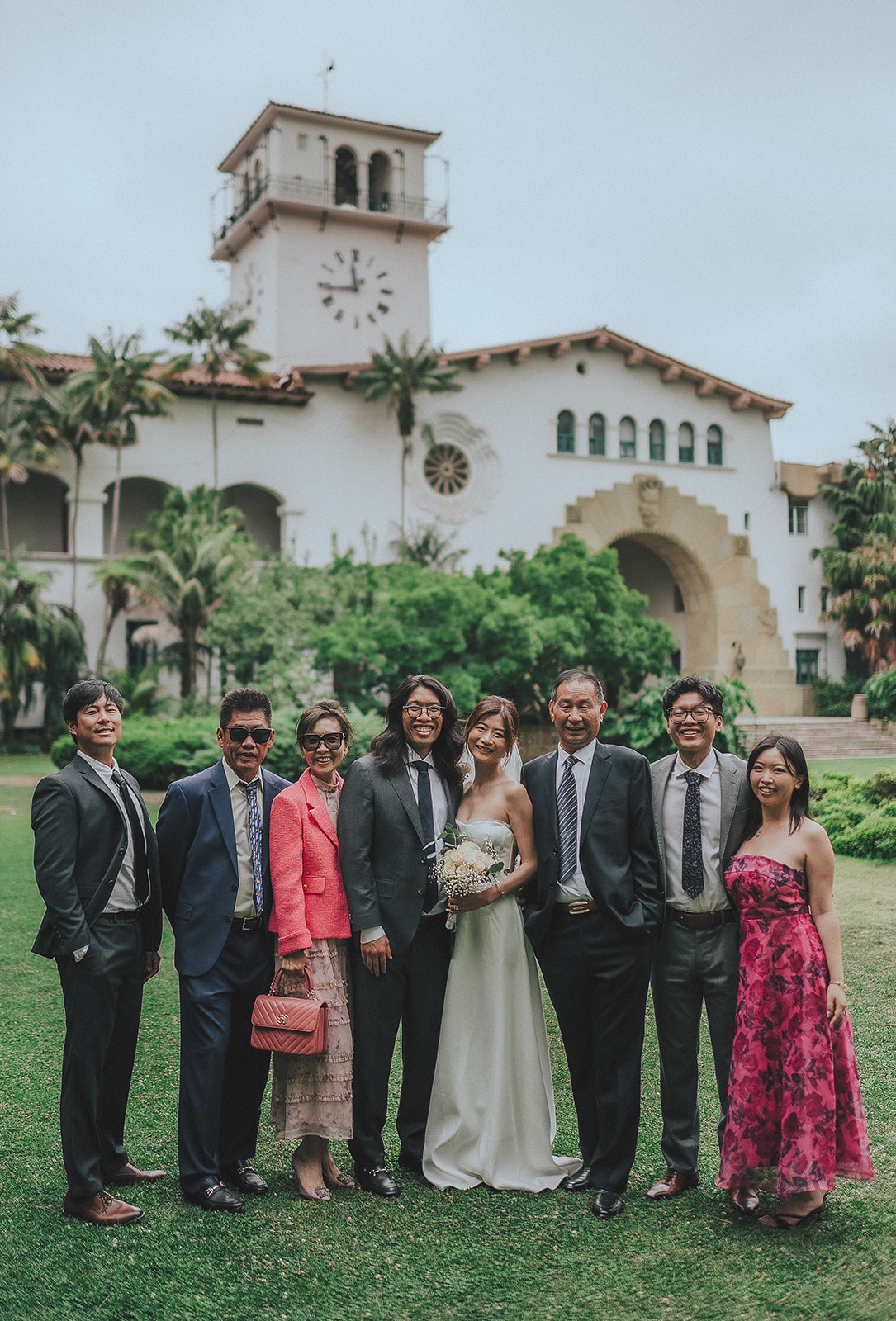 Family group celebrating outside the Santa Barbara Courthouse
