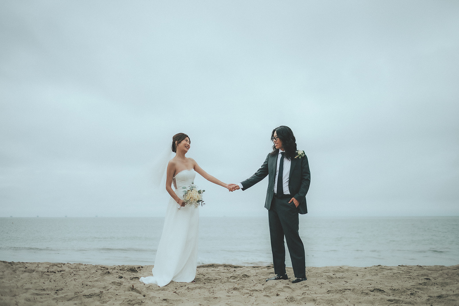 Wide newlywed portrait on the Santa Barbara coast