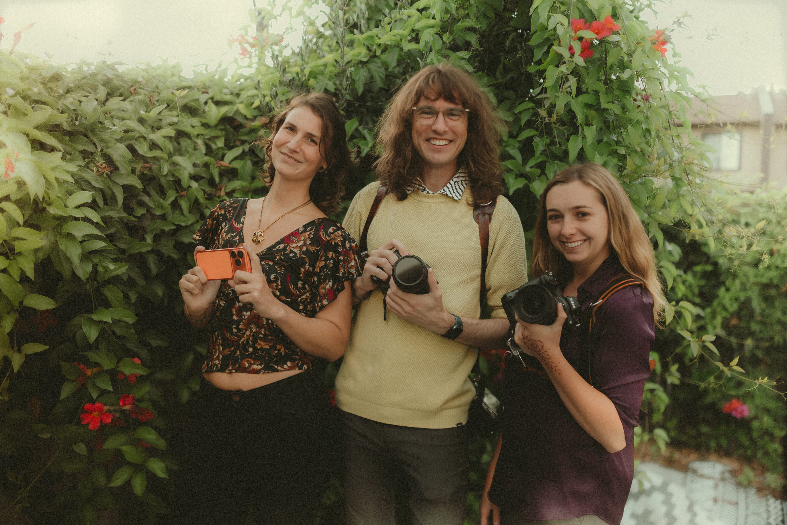 Faith, James, and Makayla together with their iPhone and cameras.